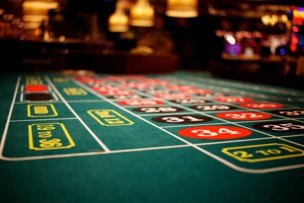 Live blackjack dealer studio with real cards and camera setup